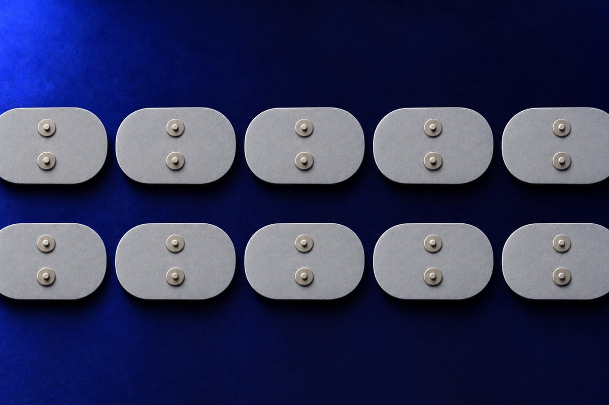 Illustrative close-up of adhesive pads and a wireless host